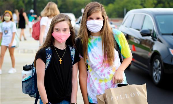 students smile on first day of school